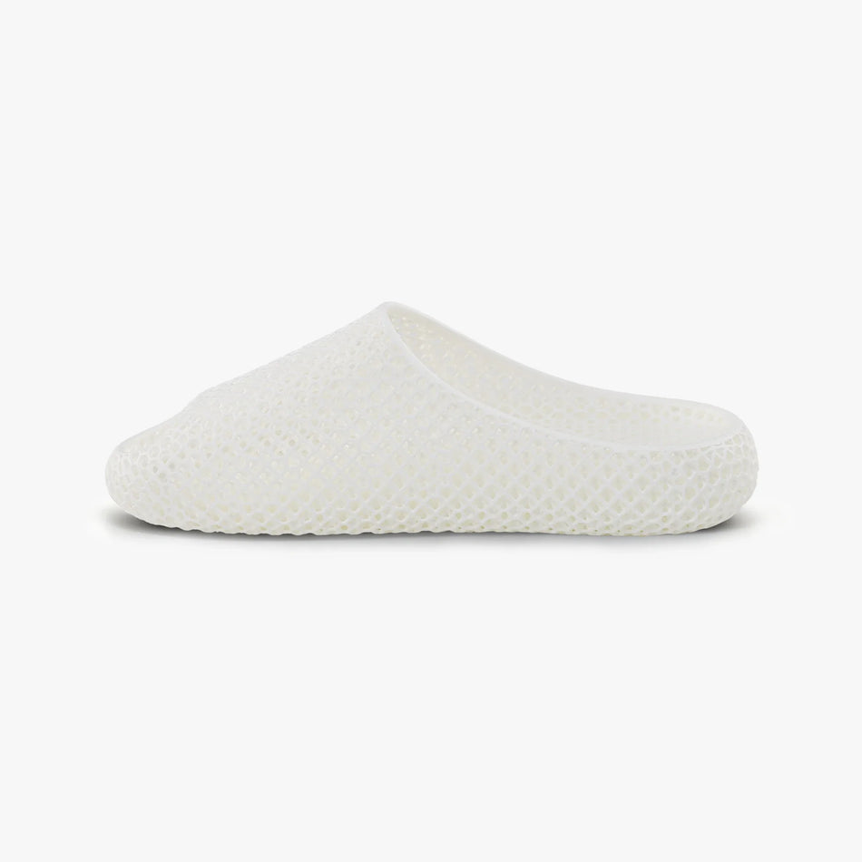 White 3D-printed slip-on slippers with textured honeycomb upper and rounded side profile