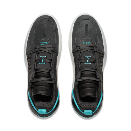 Pair of men's basketball shoes, dark charcoal uppers with teal laces and white midsoles