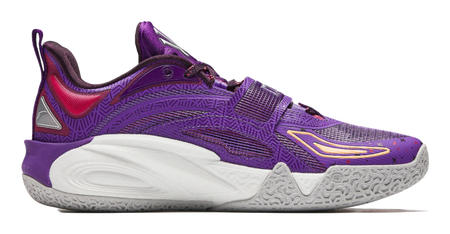 Purple basketball shoe with red heel accents, strap details, and white/gray outsole.