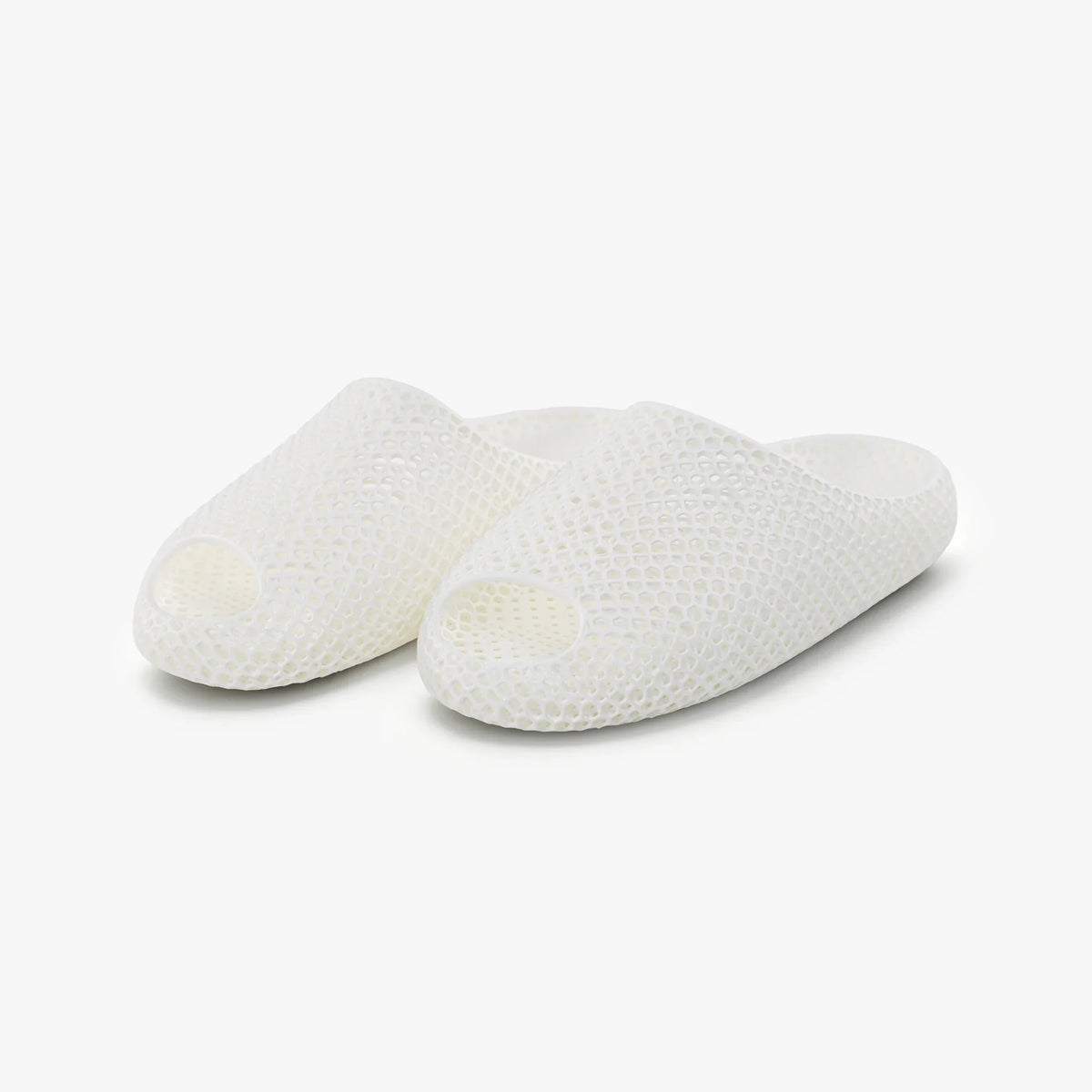 AeroCloud 3D printed slippers, white, side view with textured footbed