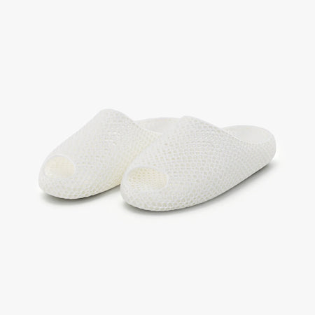 AeroCloud 3D printed slippers, white, side view with textured footbed