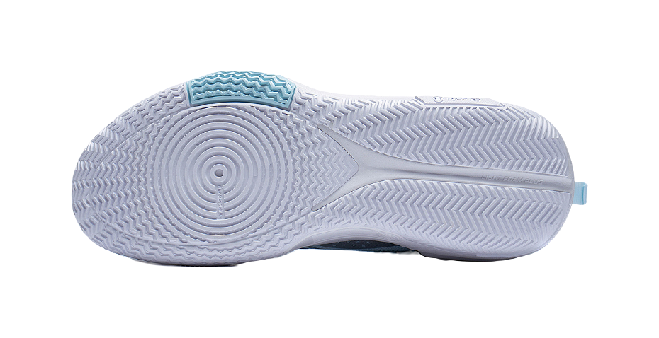 Blue basketball shoe outsole with textured herringbone tread pattern