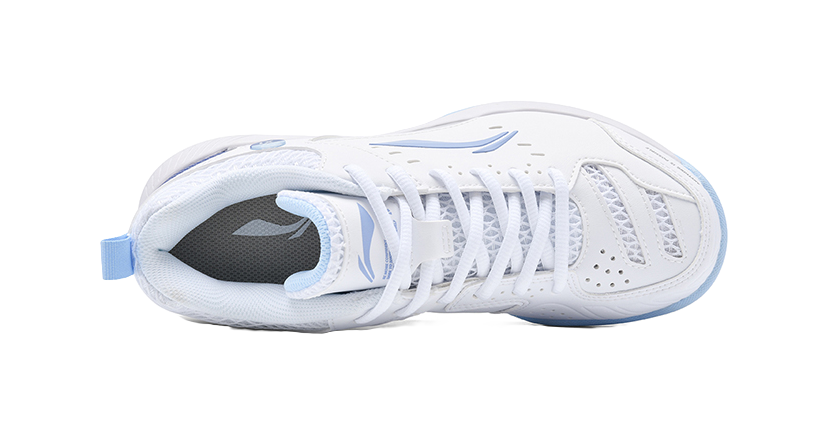 White badminton shoe with mesh tongue and padded collar, side opening visible