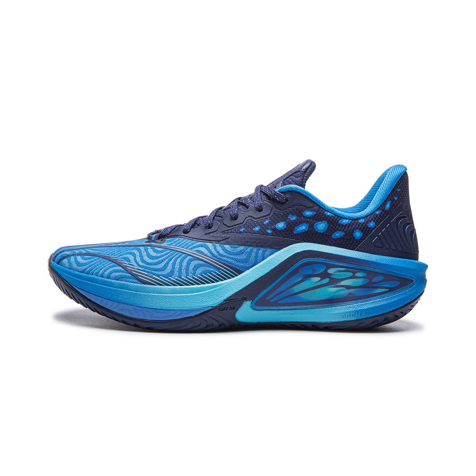 Men's basketball shoe with navy upper, blue accents, and textured wave upper pattern