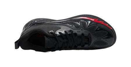 Unisex low-top basketball shoe with black upper and red accent on the outsole