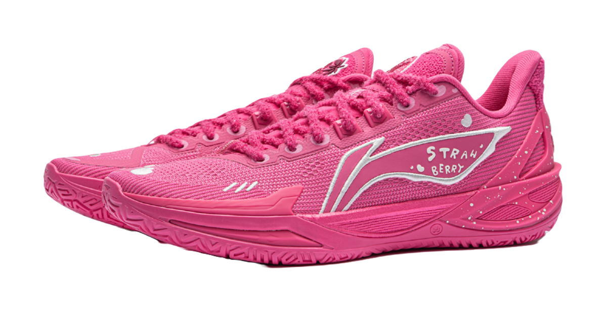 Pink low-top basketball shoe with mesh upper, laces and strawberry-themed side graphics.