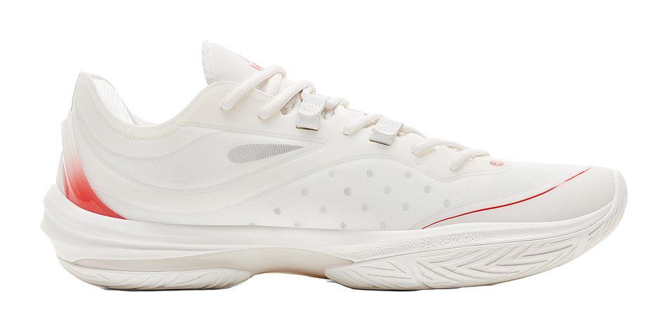 Unisex basketball shoes in milk white with red accents, side profile view