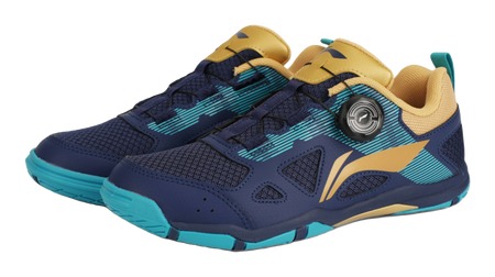 Pair of table tennis shoes in dark blue with gold panels and teal striped accents
