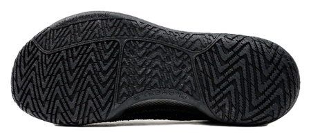Black low-top basketball shoes, rubber outsole with zigzag tread pattern.