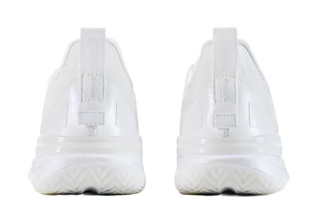 White low top basketball shoes, rear view with cushioned midsole and heel pull tab.