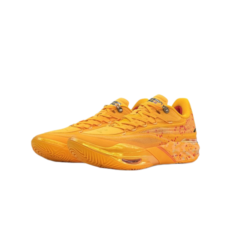 Unisex low-top basketball sneaker in yellow with lace-up front and side splatter accents