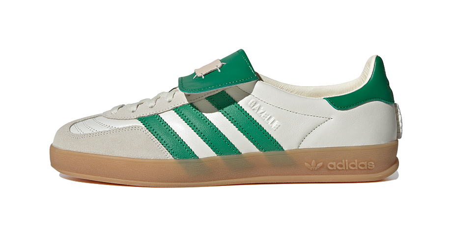 Low-top Gazelle skate shoes with white upper, green stripes, lace-up, gum sole