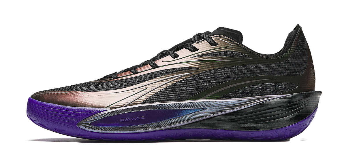Black basketball shoe with white accents and purple midsole, low-cut lace-up