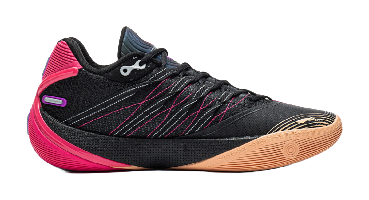 Low basketball shoe angled view: black upper with pink heel, purple logo, gum sole.