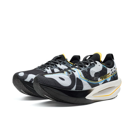 Marathon racing shoe in black and white with blue stripe midsole, yellow collar tab