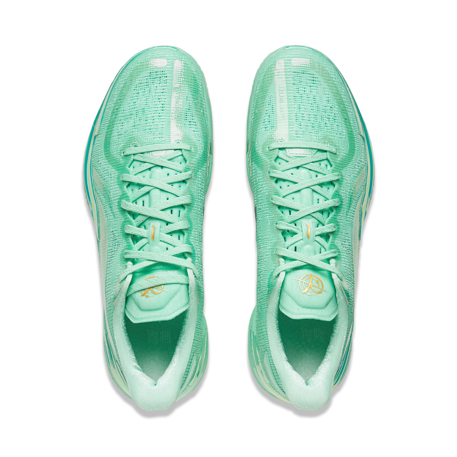 Pair of mint-green shoes showing lace-up tongues and light translucent heel guards.