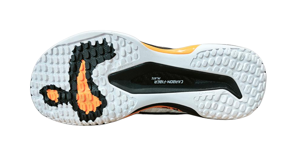 Men's badminton shoe outsole with molded tread, white rubber with orange and black sections