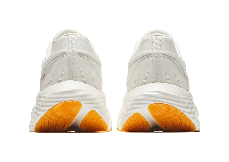 Anta PG 7 low-top running shoes, rear view with padded heel and orange tread pods