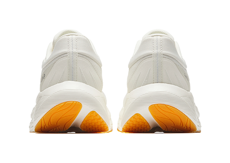 Anta PG 7 low-top running shoes, rear view with padded heel and orange tread pods