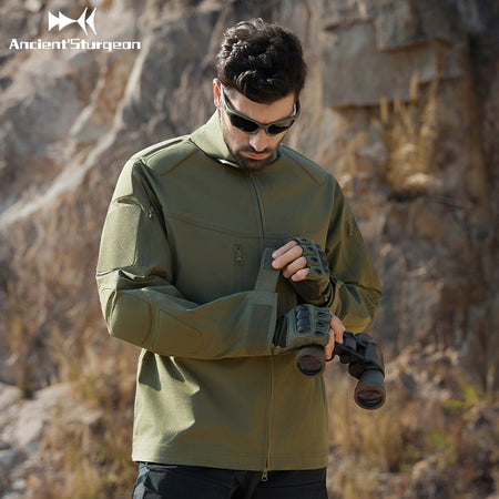 Green tactical jacket front quarter view with zip and utility sleeve pocket