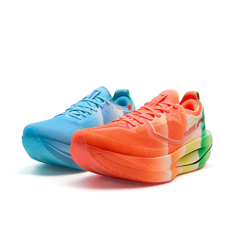Marathon racing shoes pair: orange-red and blue uppers with green accents and cushioned soles