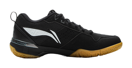 Black badminton shoe side view with white W-shaped stripe and patterned quarter panel.