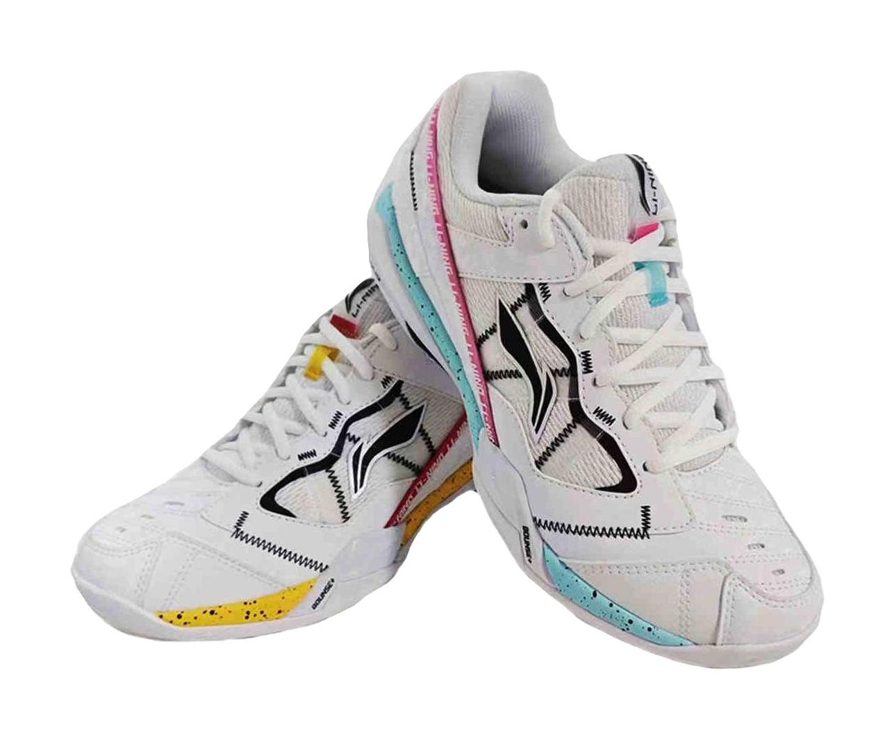 Men's white badminton shoe pair with black panels, teal sole edge, pink trim