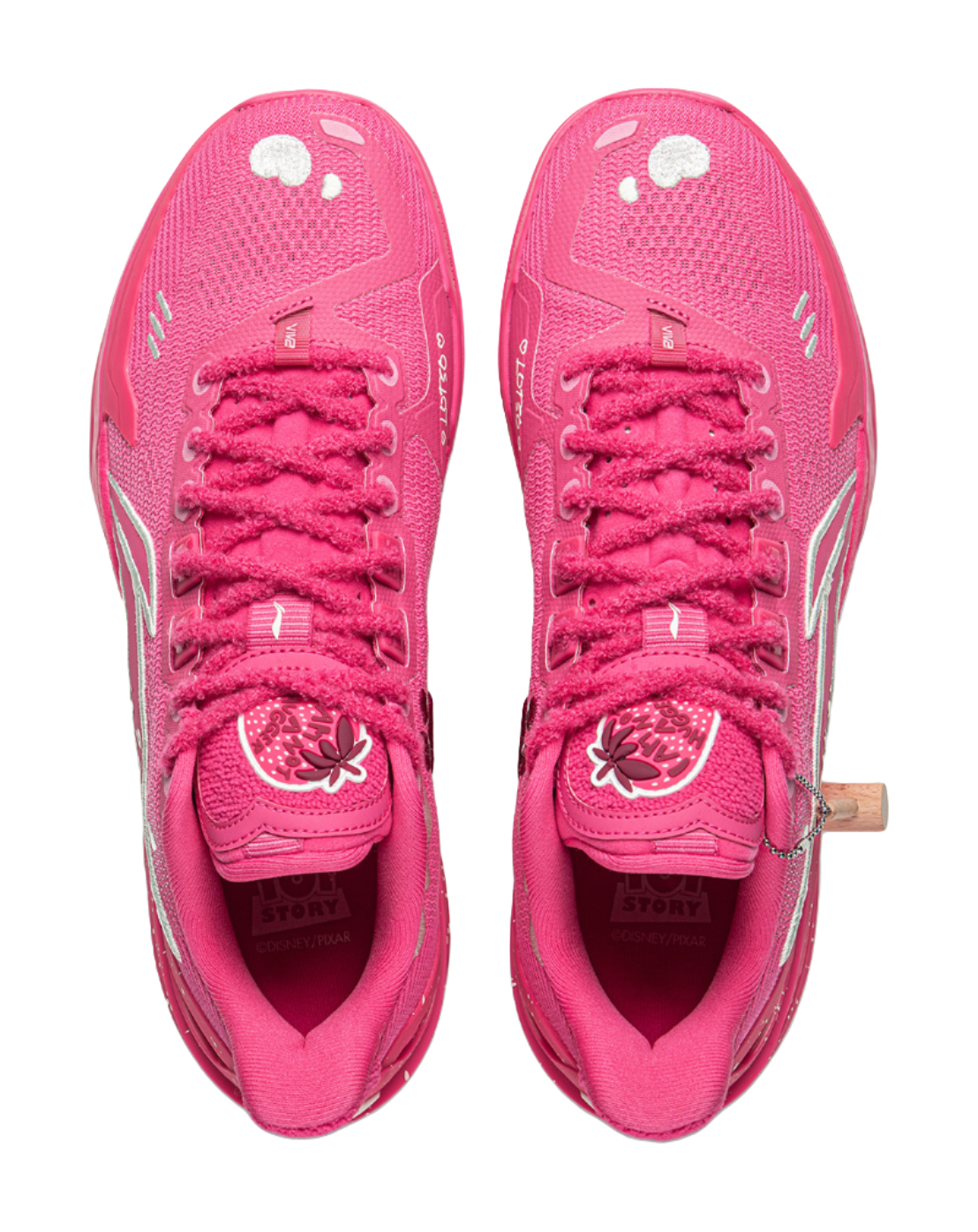 Pair of pink low-top basketball shoes shown from above, with mesh uppers and lace-up fronts.