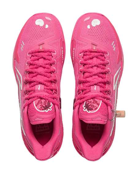 Pair of pink low-top basketball shoes shown from above, with mesh uppers and lace-up fronts.