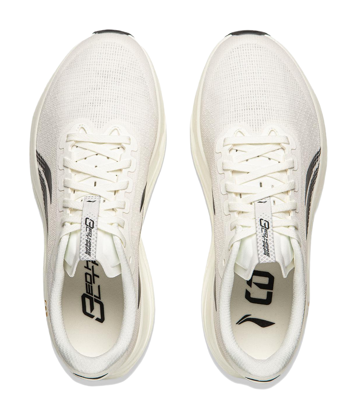 Champagne white running shoe pair with lace-up front and black heel logo
