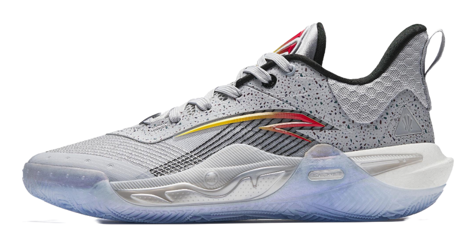 Light gray basketball shoes with black and red accents, lace-up with cushioned sole
