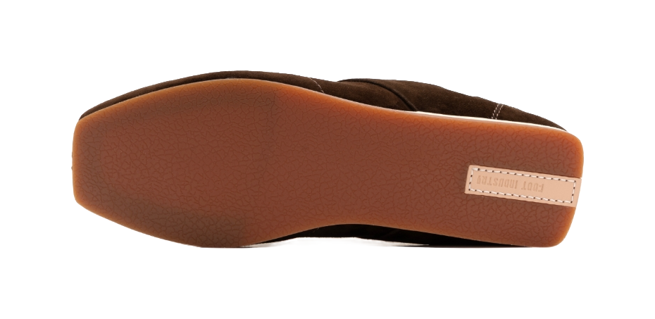 Women's dark brown outsole with textured tread and white midsole edge