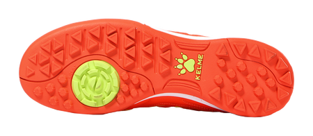 Orange outsole of TF training soccer shoes with tread studs and round KELME emblem