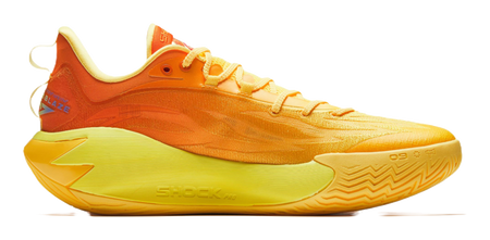 Low-profile basketball shoe in orange and yellow with lace-up front and textured outsole.