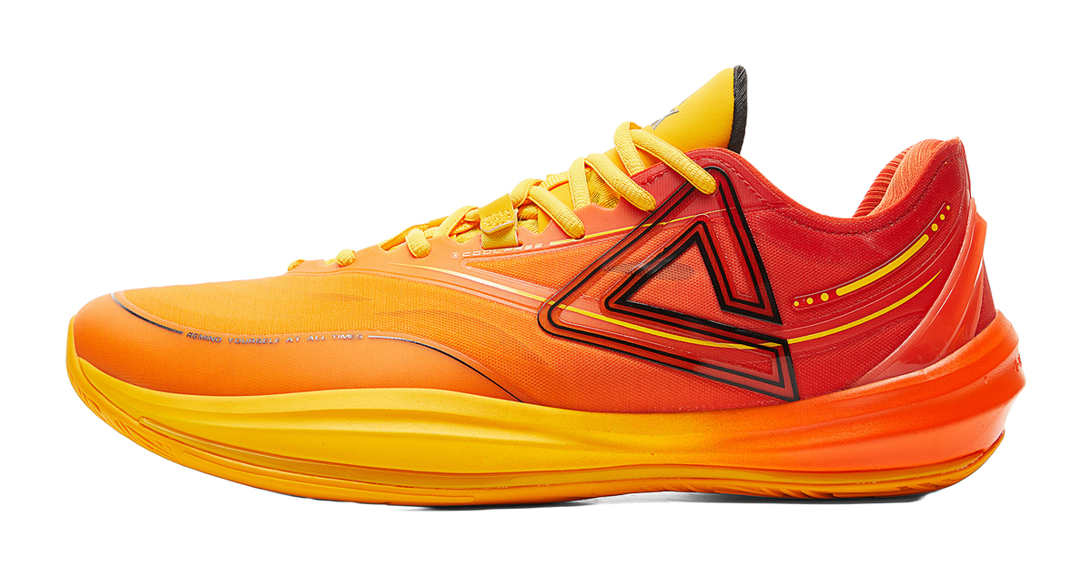 Basketball shoe with orange/yellow lace-up upper and bold side logo