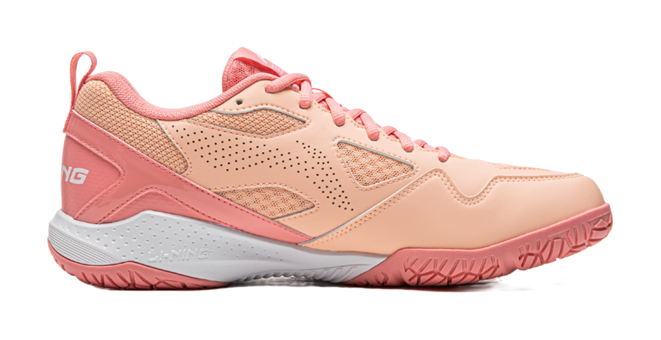 Unisex indoor badminton shoe, side view in pink and white with pink lace-up closure
