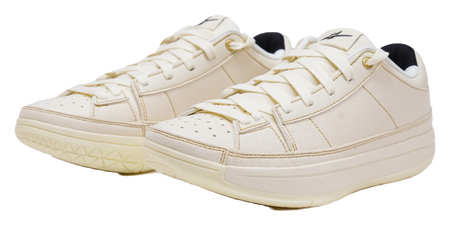 Cream lace-up sneakers with perforated toe panel and cushioned collar
