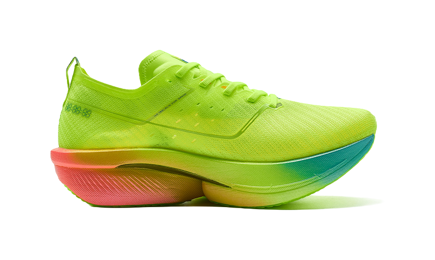 Neon green low-top running shoes, side view with thick multicolor midsole