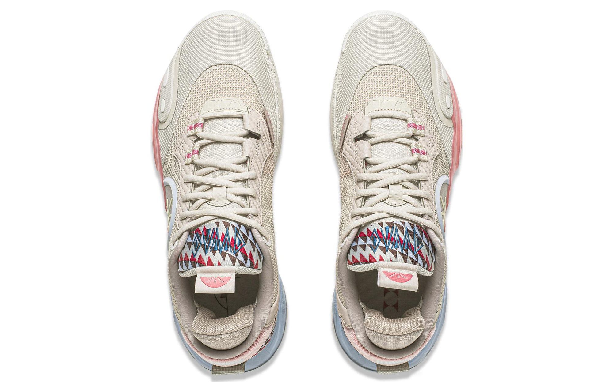 Beige lace-up basketball shoes with mesh uppers, geometric heel panel, and cushioned tongue.
