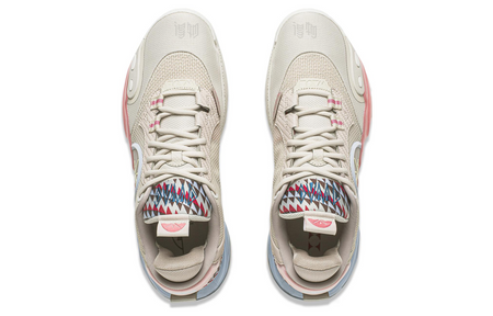 Beige lace-up basketball shoes with mesh uppers, geometric heel panel, and cushioned tongue.