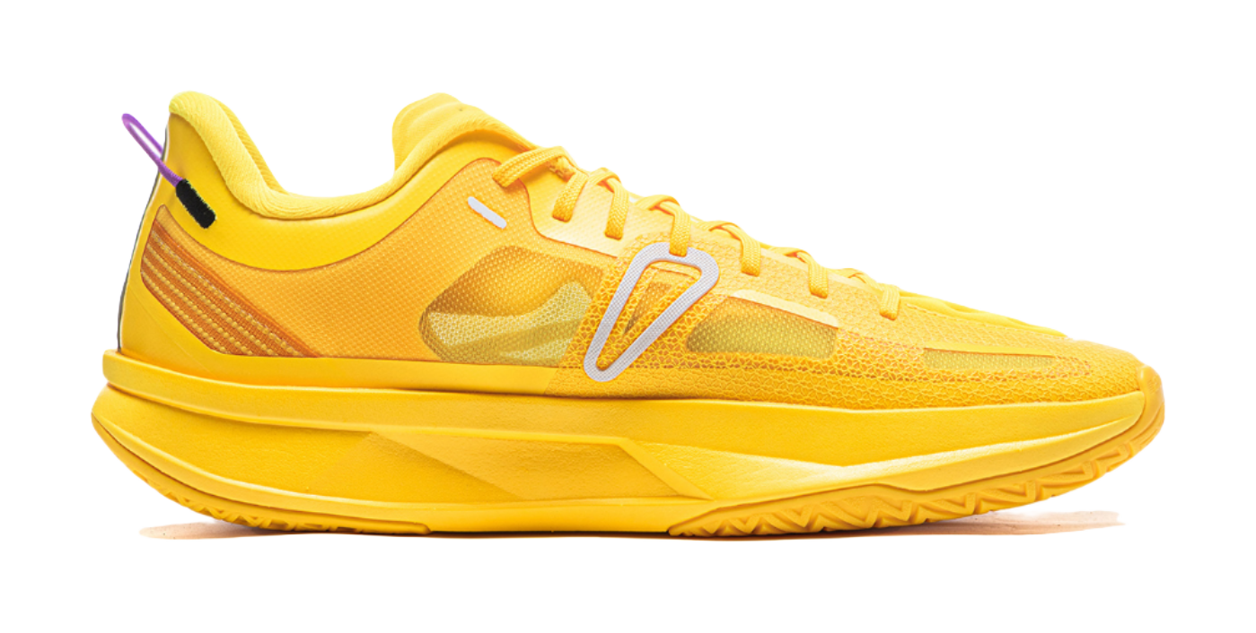 Yellow basketball shoe with textured upper, white stripes, and lace-up front