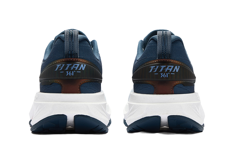 Men's running shoes heel view in dark navy and light blue with 'TITAN' branding