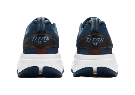 Men's running shoes heel view in dark navy and light blue with 'TITAN' branding