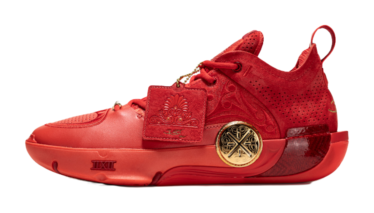 Red mid-top basketball shoes with lace-up front and cushioned sole.