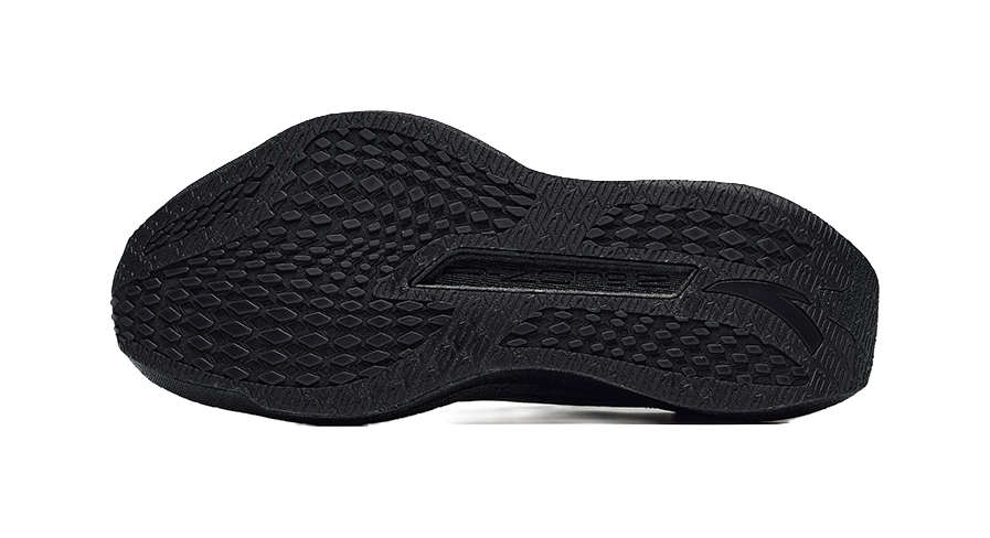 Men's black running shoe outsole with textured traction pattern and molded heel pad