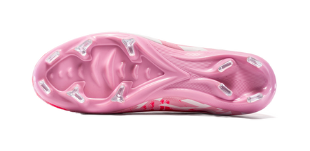 Pink firm-ground cleat outsole with molded studs and patterned heel