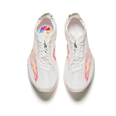 White lace-up racing sneakers with multicolor splatter on mesh upper and padded tongue