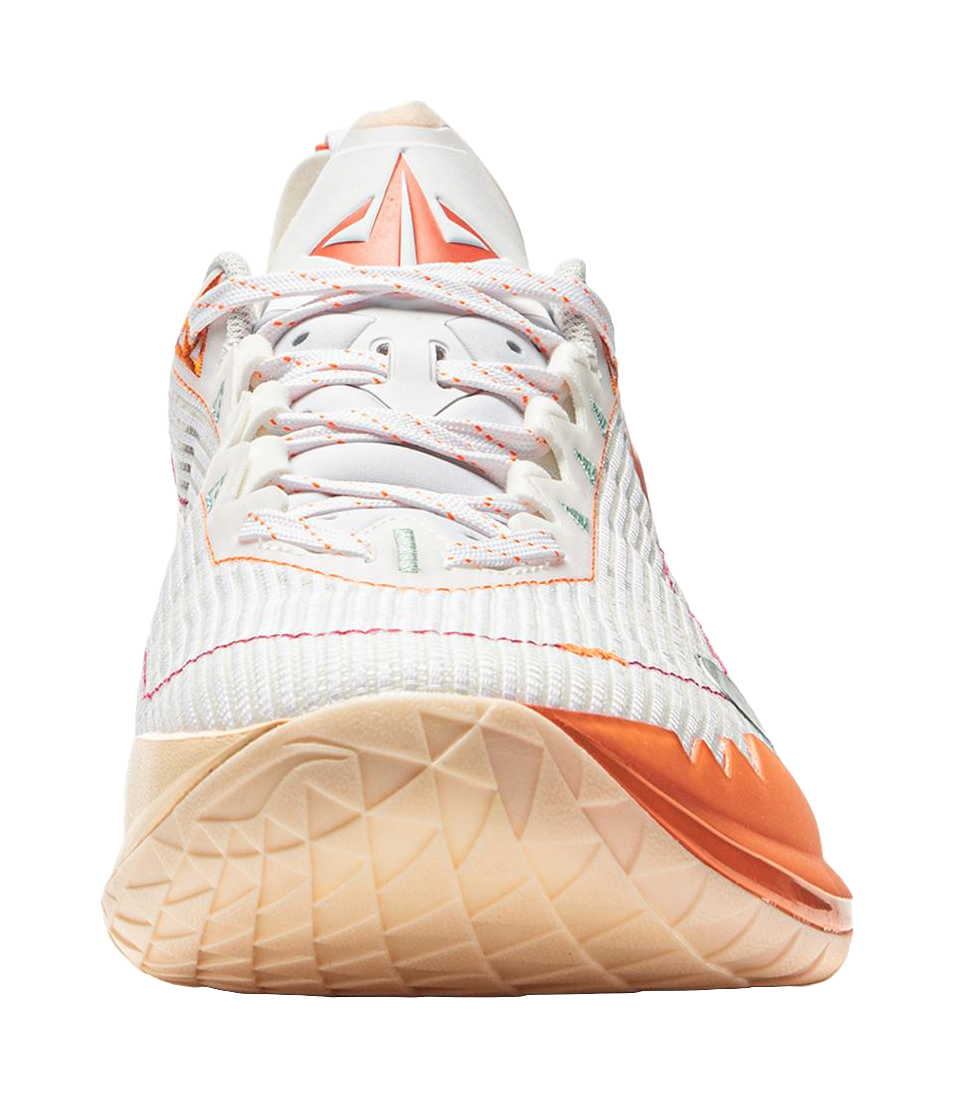 White basketball shoe front with orange stitching and textured beige outsole