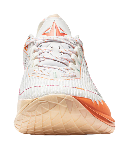 White basketball shoe front with orange stitching and textured beige outsole