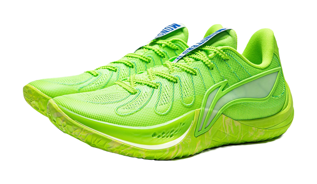 Green basketball shoe with blue heel strap, lace-up upper, and chunky sole